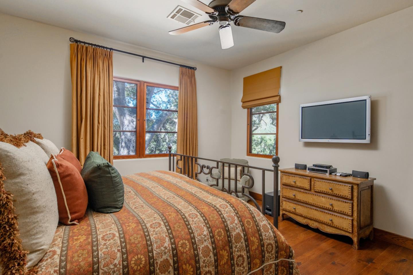 35 Rancho San Carlos Road Carmel, CA 93923 - Photo 30 of 47 a bedroom with a bed and a window