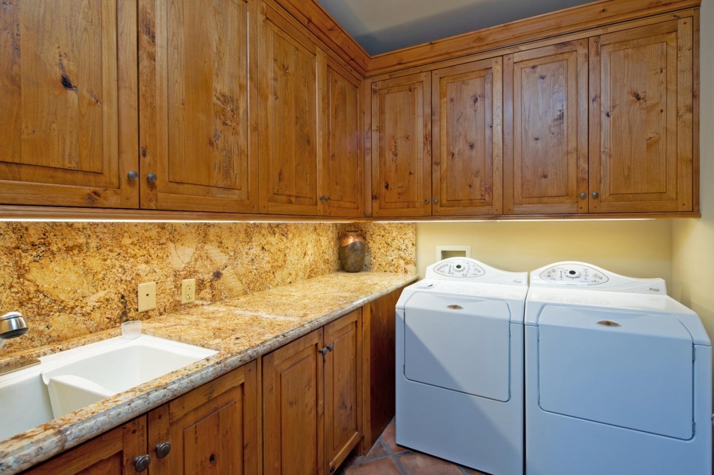 35 Rancho San Carlos Road Carmel, CA 93923 - Photo 35 of 47 a utility room with dryer and washer