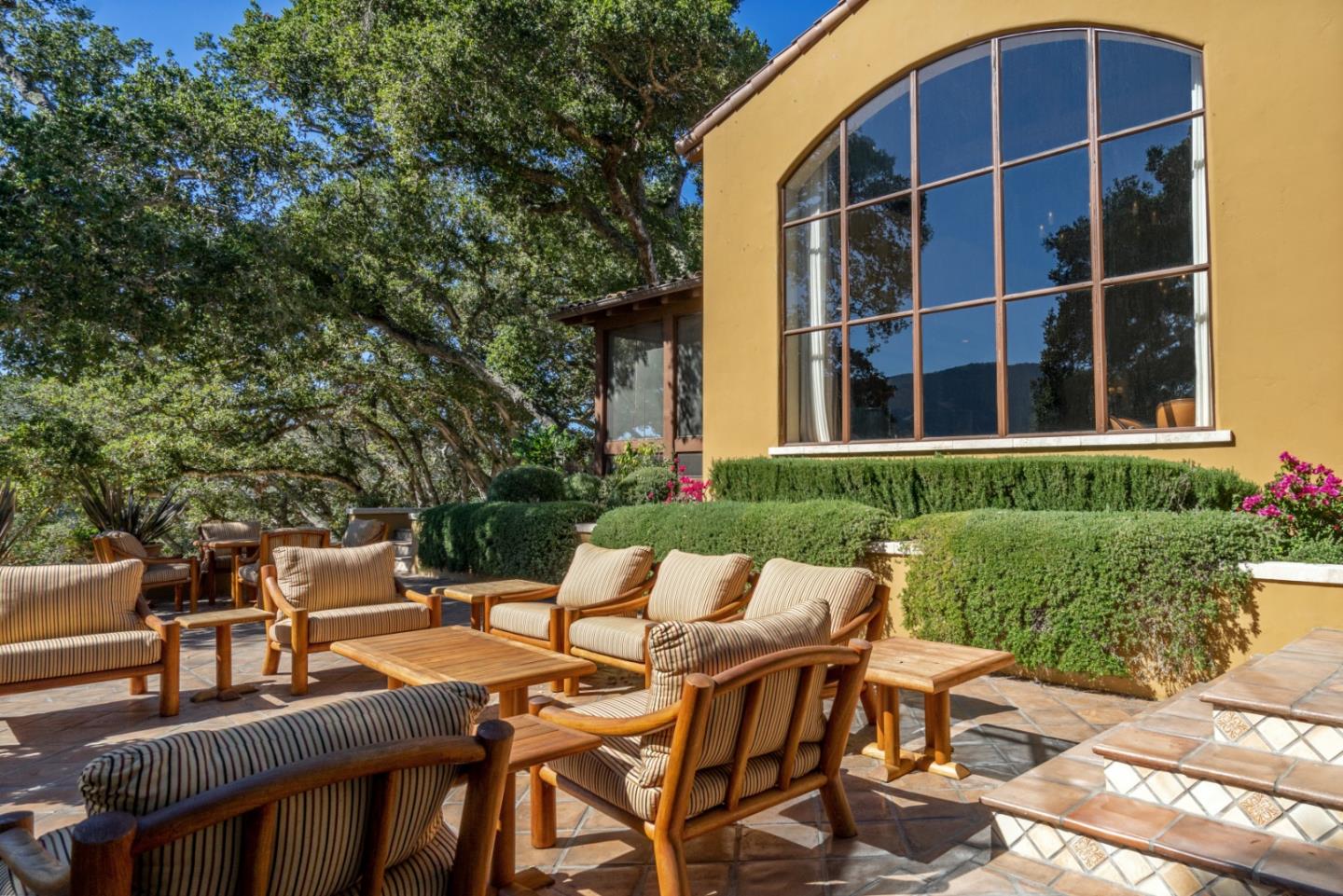 35 Rancho San Carlos Road Carmel, CA 93923 - Photo 36 of 47 a view of a patio with table and chairs and potted plants