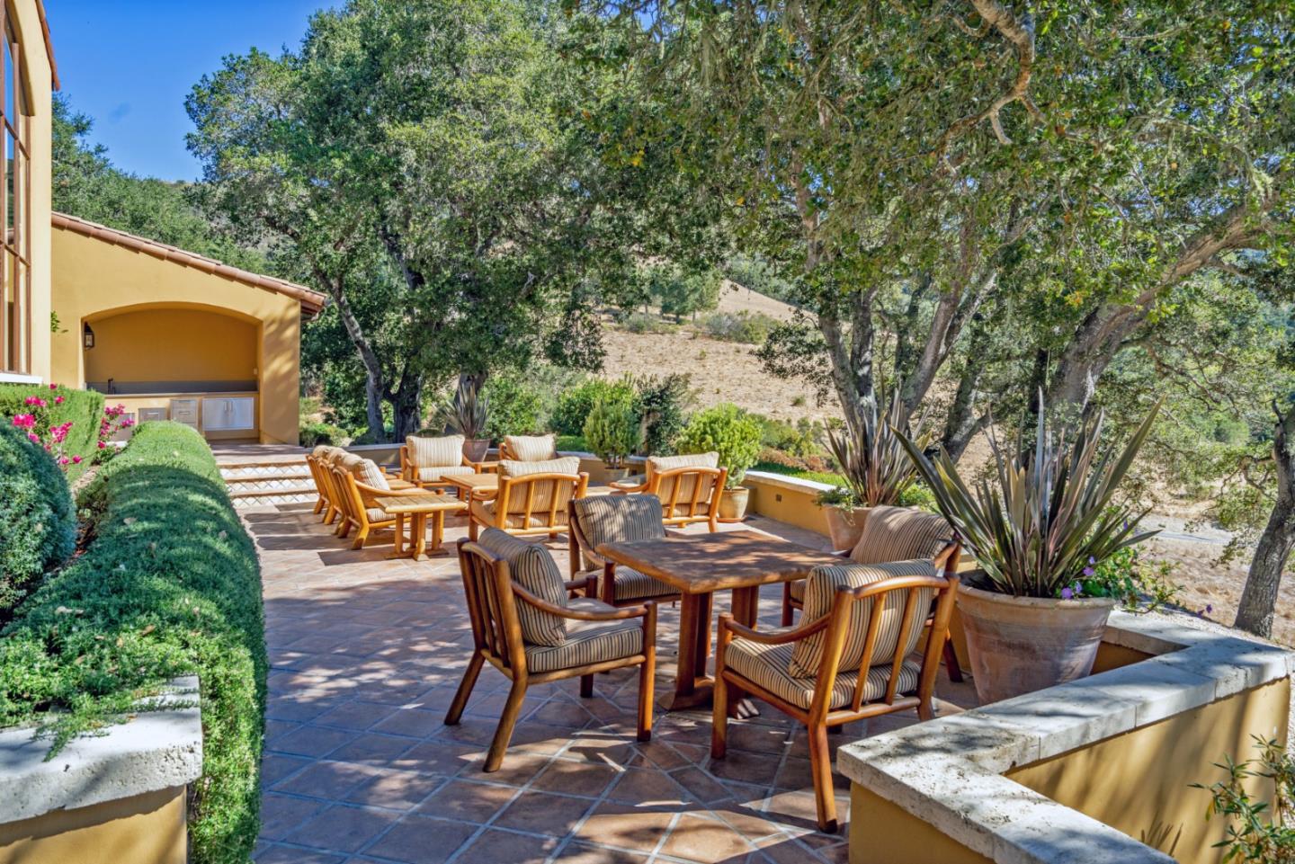 35 Rancho San Carlos Road Carmel, CA 93923 - Photo 37 of 47 a view of a patio with table and chairs and potted plants