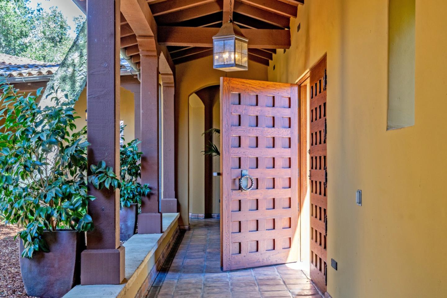 35 Rancho San Carlos Road Carmel, CA 93923 - Photo 4 of 47 a front view of a house with plants