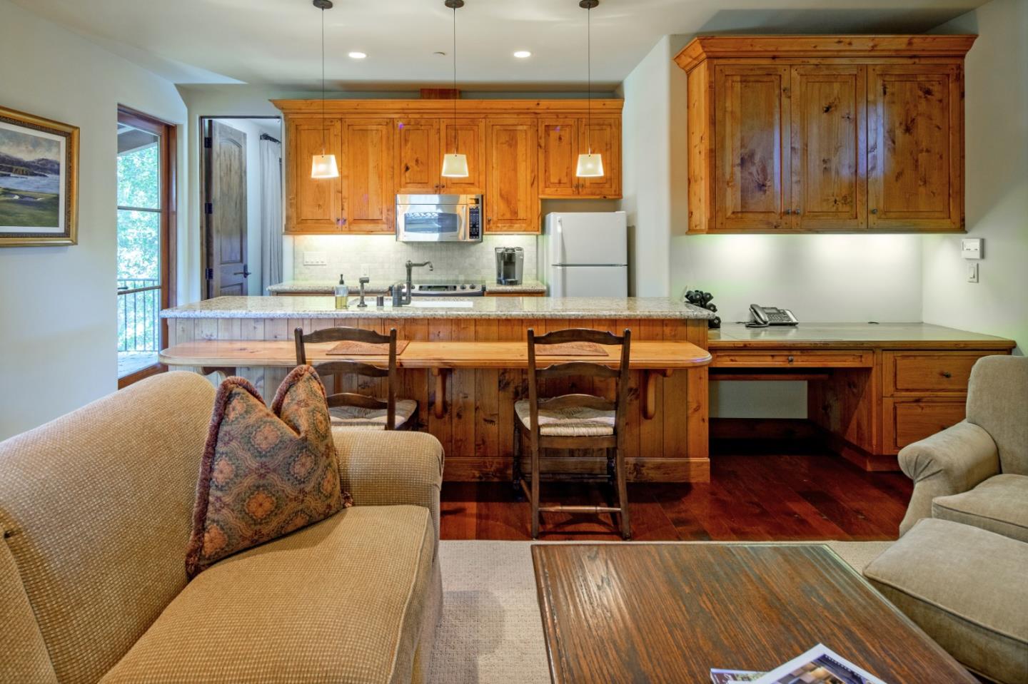 35 Rancho San Carlos Road Carmel, CA 93923 - Photo 42 of 47 a living room with furniture and a large window