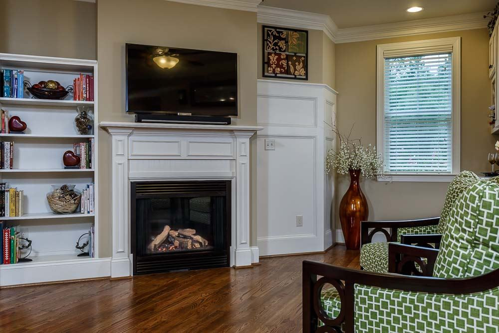 8103 Dreamy Way Raleigh, NC 27613 - Photo 10 of 25 The Glow of a Fireplace, sipping on wine and a place for friends to gather all in the comfort of your Kitchen Area. Everyone wants to gather in the kitchen. Now, you have a great space for that to happen!! Keeping Room
