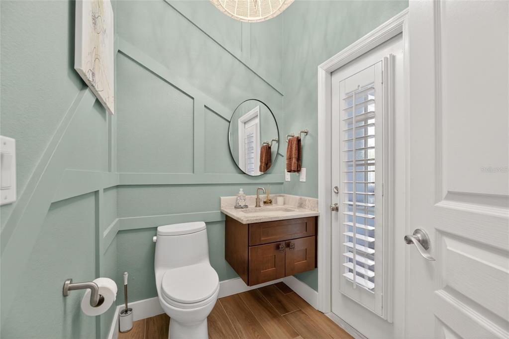 508 Islebay Drive Apollo Beach, FL 33572 - Photo 36 of 98 a bathroom with a toilet sink and mirror