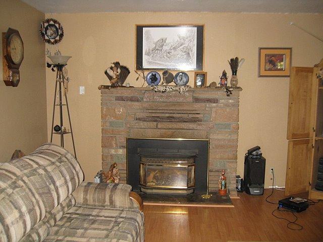 2685 Tremonto Road Anderson, CA 96007 - Photo 8 of 11 Living room with rock fireplace