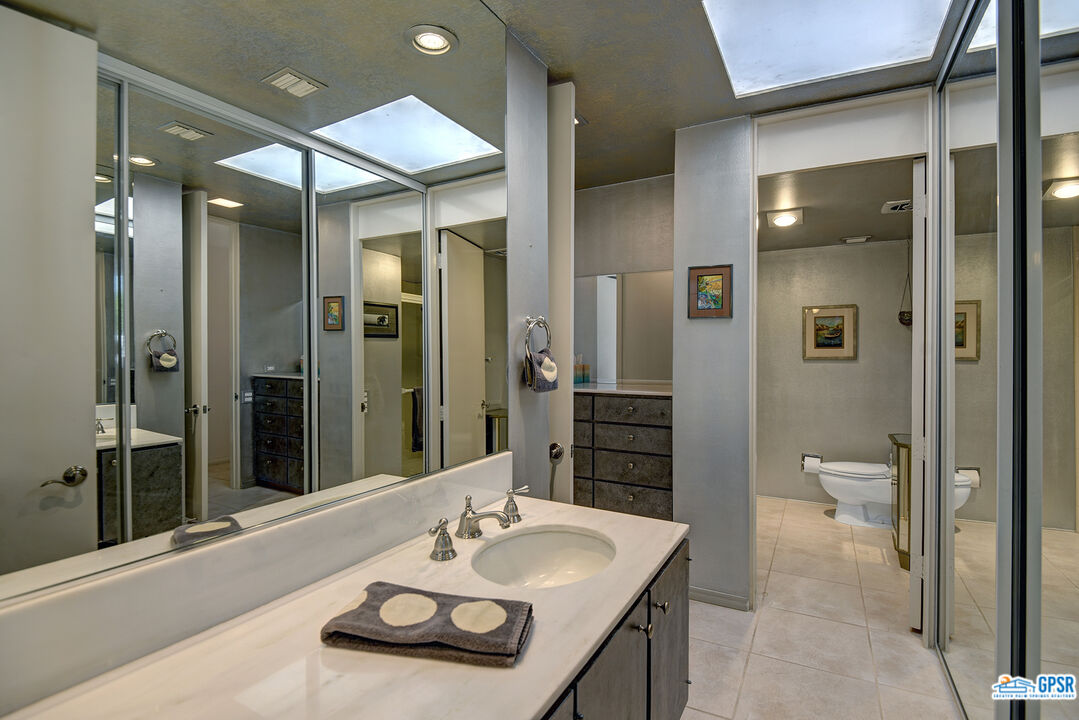 37659 Palm View Road Rancho Mirage, CA 92270 - Photo 41 of 48 a bathroom with a sink a toilet and shower