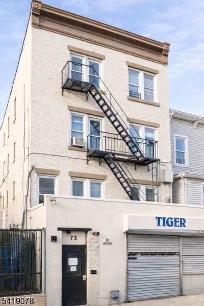 a view of building with large windows
