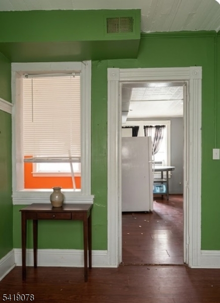 73 4th Street, Unit B1 Passaic, NJ 07055 - Photo 11 of 12 a view of kitchen with furniture and a window