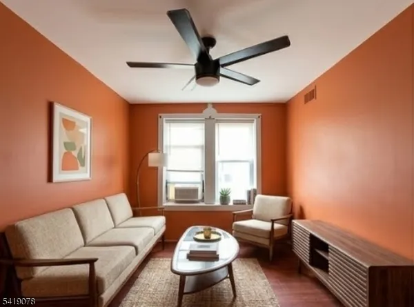 a living room with furniture and a window