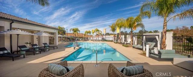 a view of a patio with swimming pool