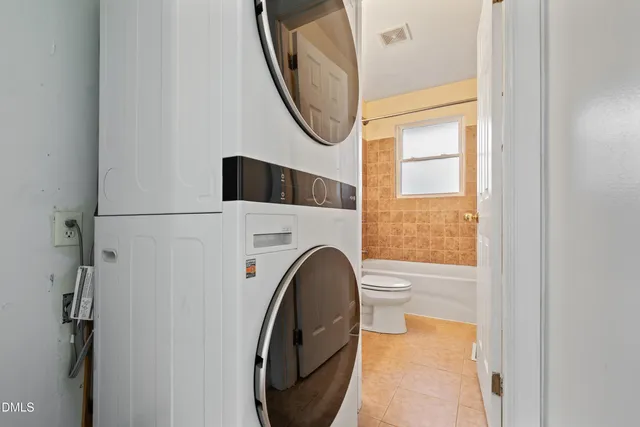 a bathroom with a sink a mirror and a shower