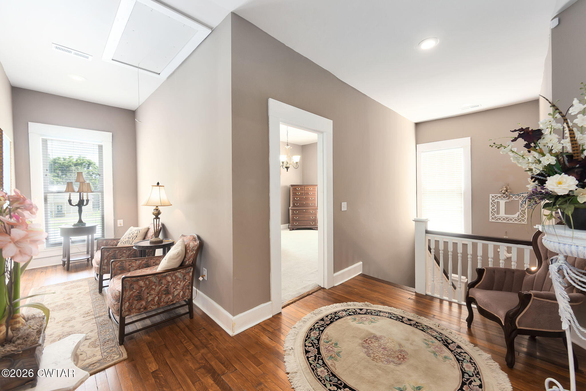 554 East Main Street Jackson, TN 38301 - Photo 28 of 60 a living room with furniture and wooden floor