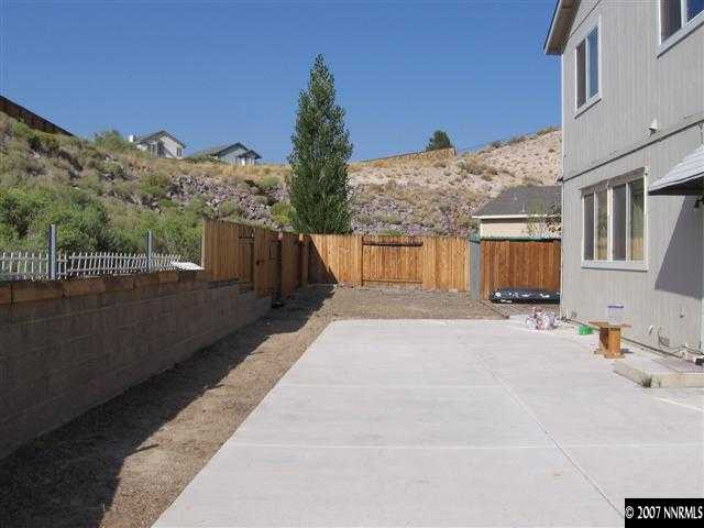 2585 Rio Rico Court Reno, NV 89523 - Photo 5 of 9 a front view of a house with a yard
