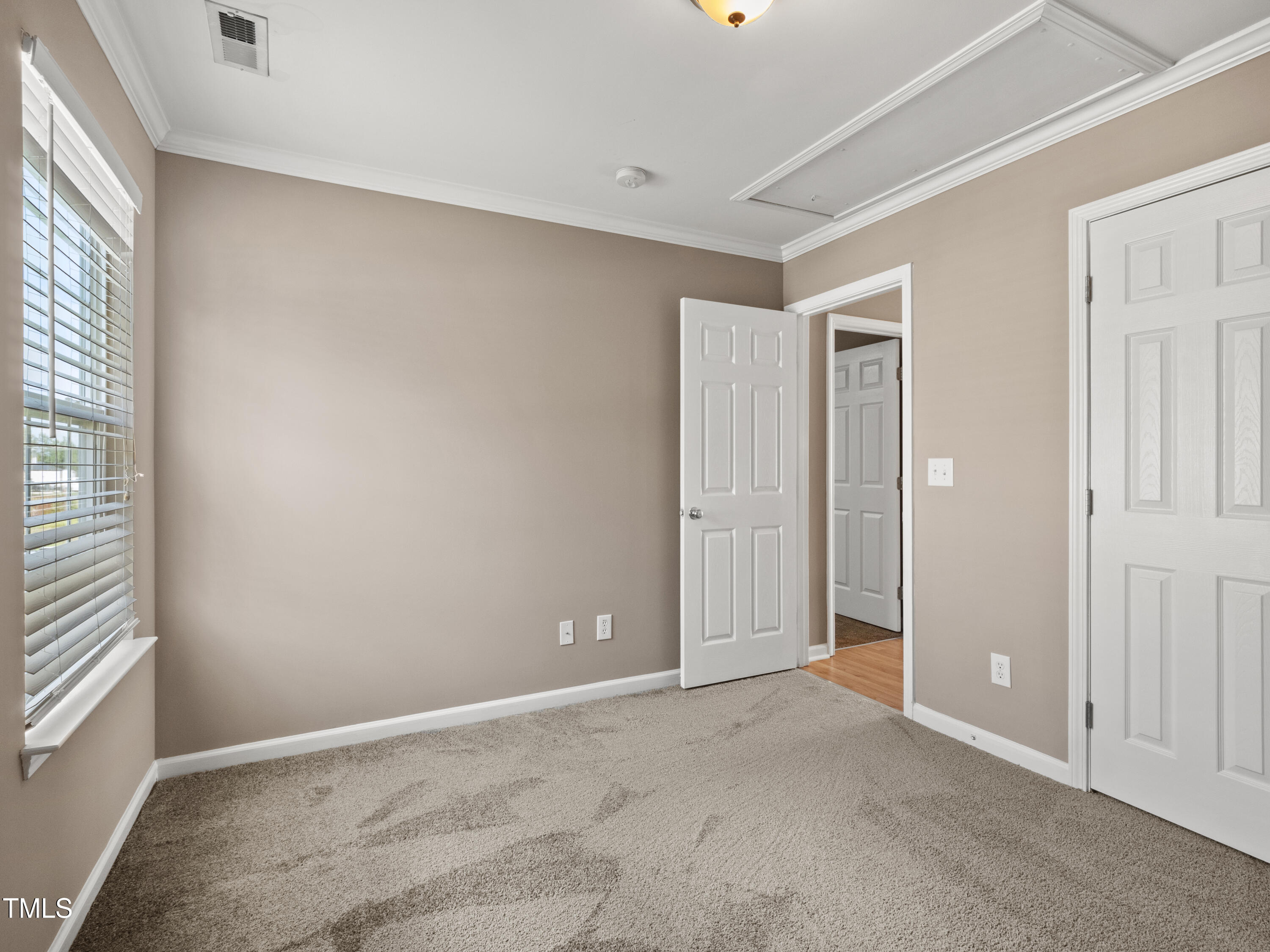 115 Geranium Street Durham, NC 27704 - Photo 37 of 47 an empty room with windows