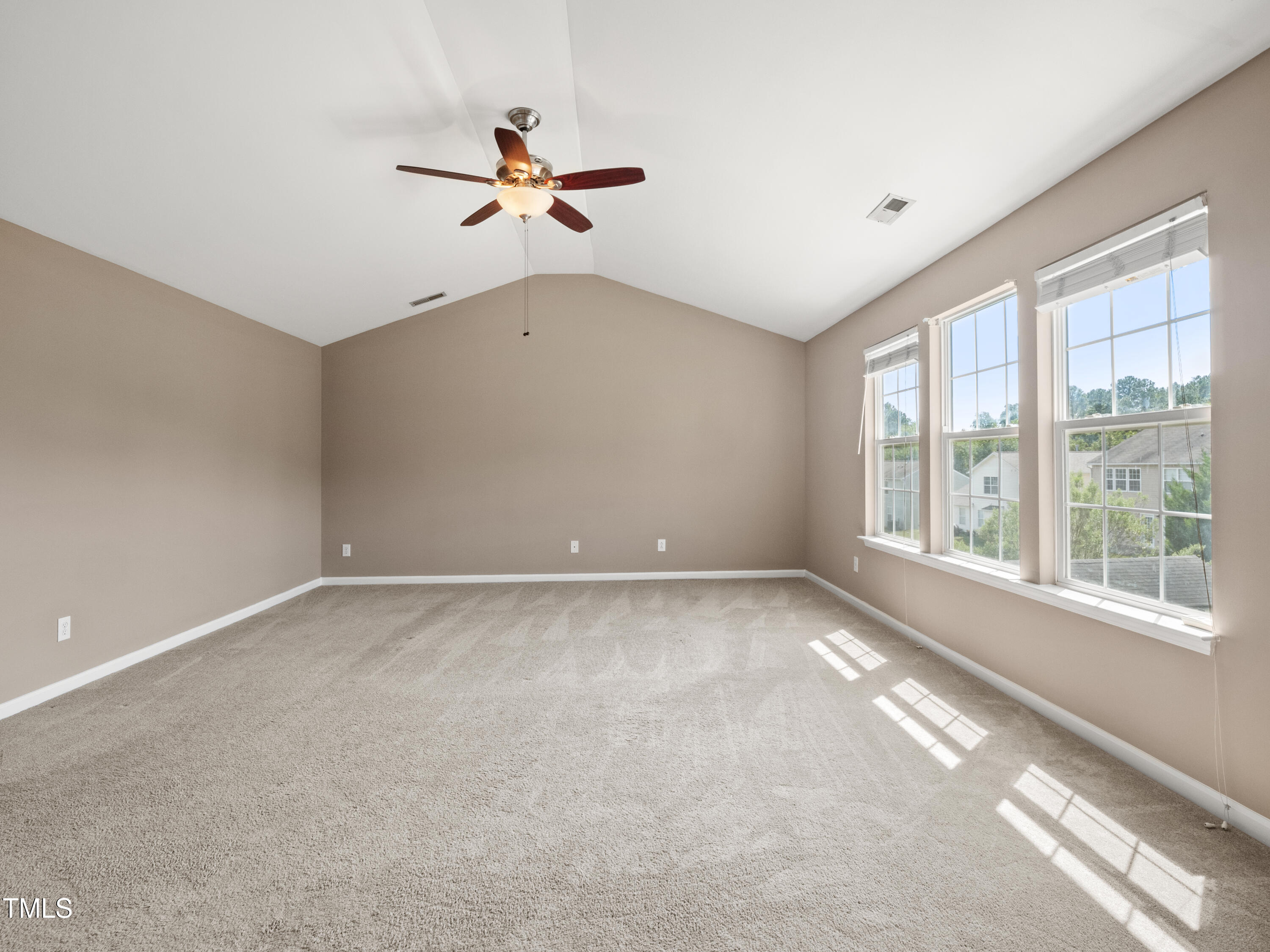 115 Geranium Street Durham, NC 27704 - Photo 39 of 47 a view of a livingroom with a ceiling fan and window