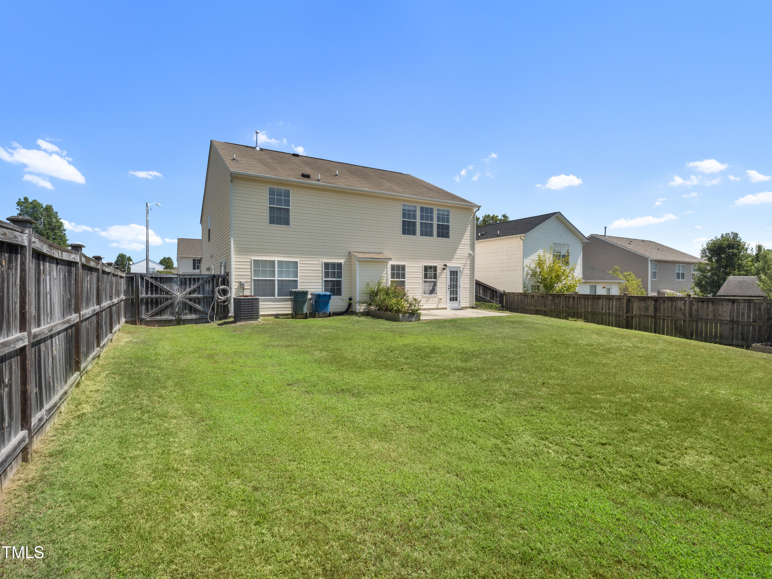 115 Geranium Street Durham, NC 27704 - Photo 4 of 47 a view of a house with a big yard