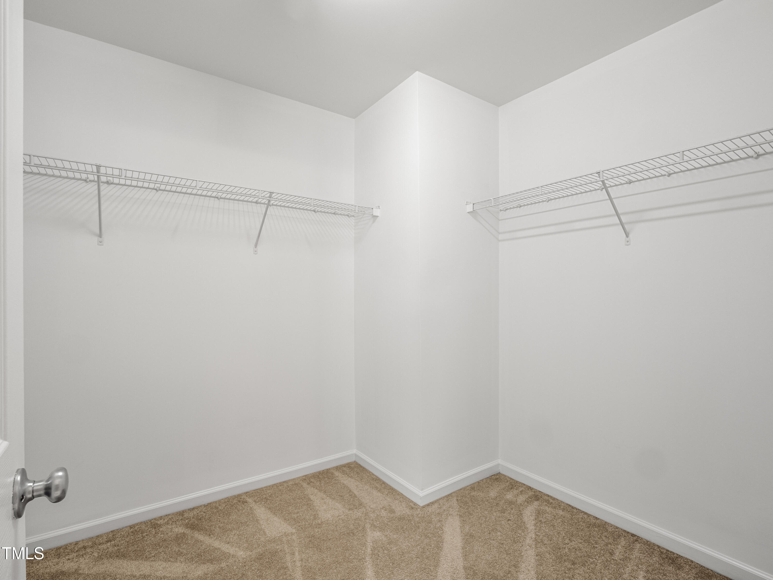 115 Geranium Street Durham, NC 27704 - Photo 42 of 47 a view of a room with racks on the wall