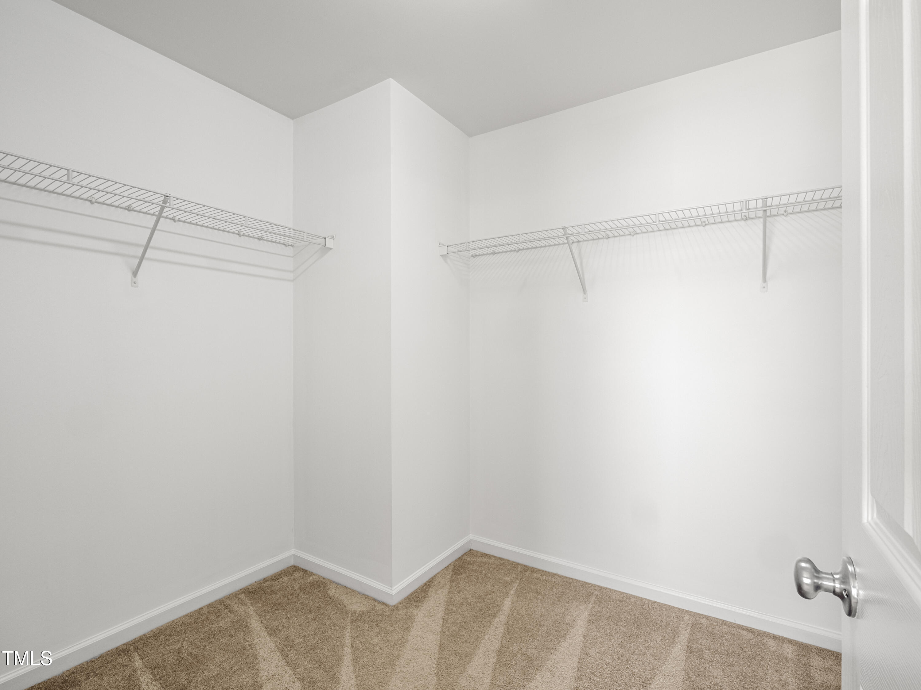 115 Geranium Street Durham, NC 27704 - Photo 43 of 47 a view of a room with racks on the wall