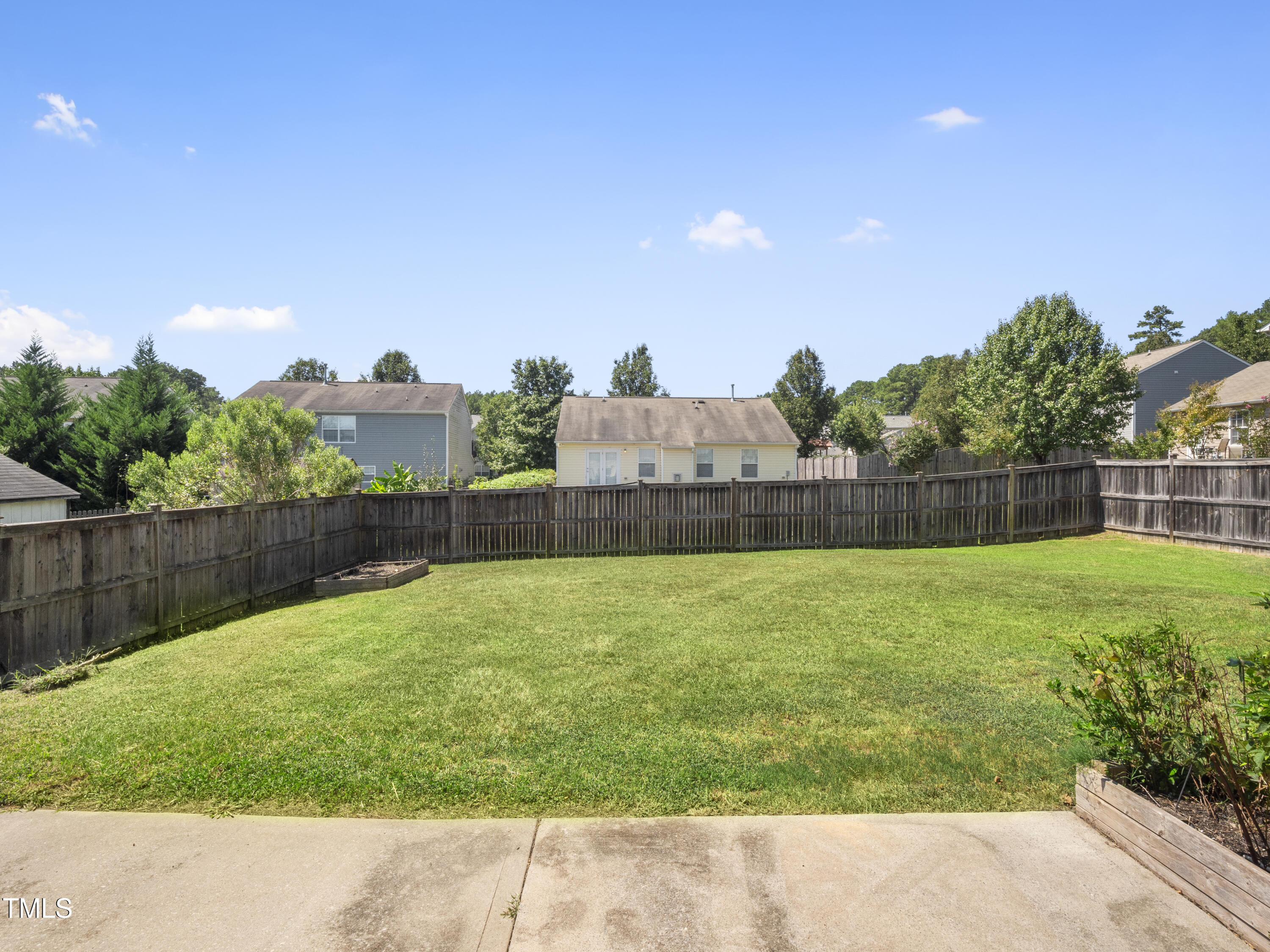115 Geranium Street Durham, NC 27704 - Photo 5 of 47 a view of a backyard