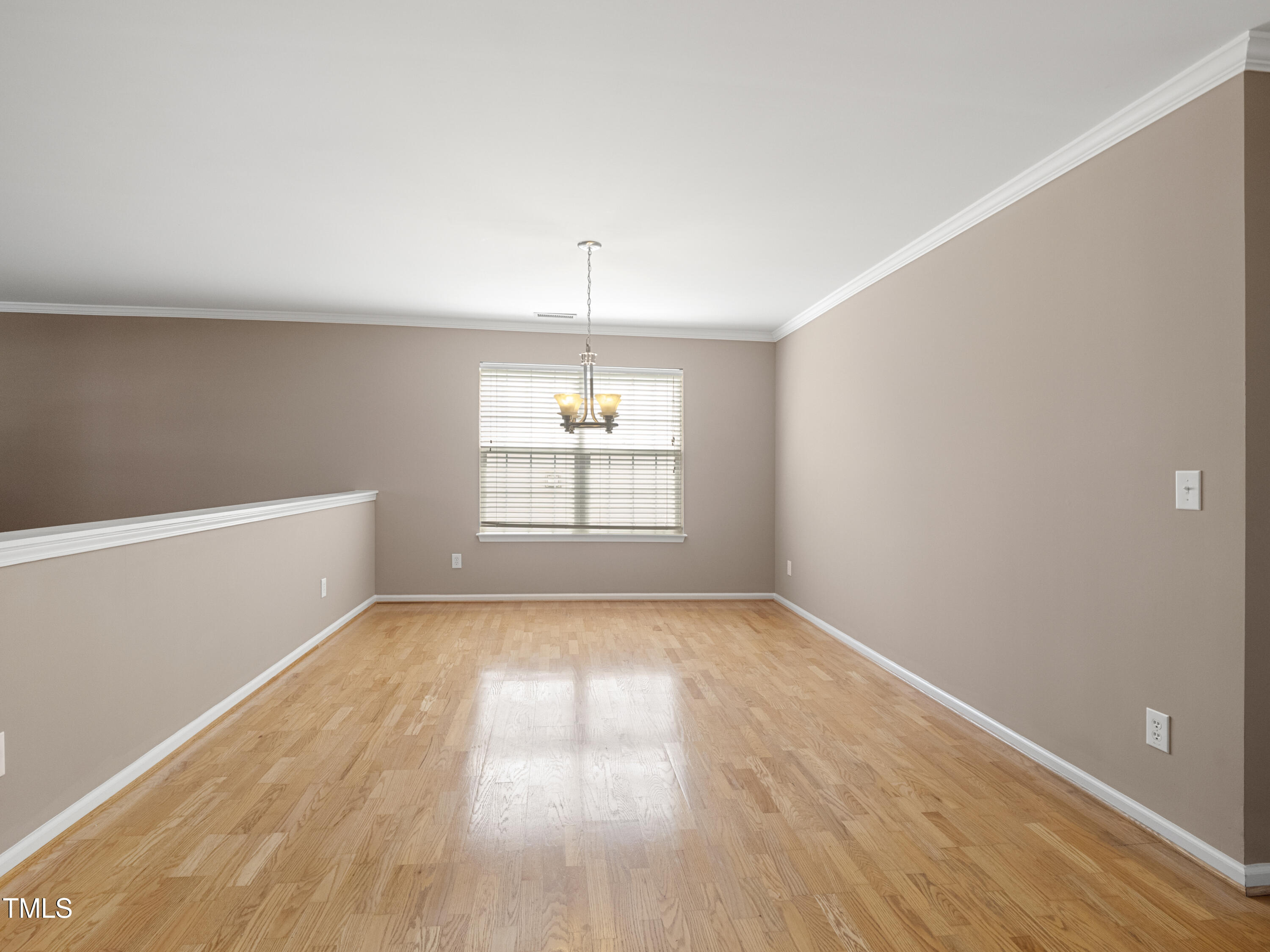 115 Geranium Street Durham, NC 27704 - Photo 8 of 47 wooden floor in an empty room with a window