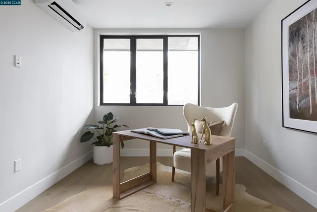 a spacious bathroom with a double vanity sink a toilet and a mirror