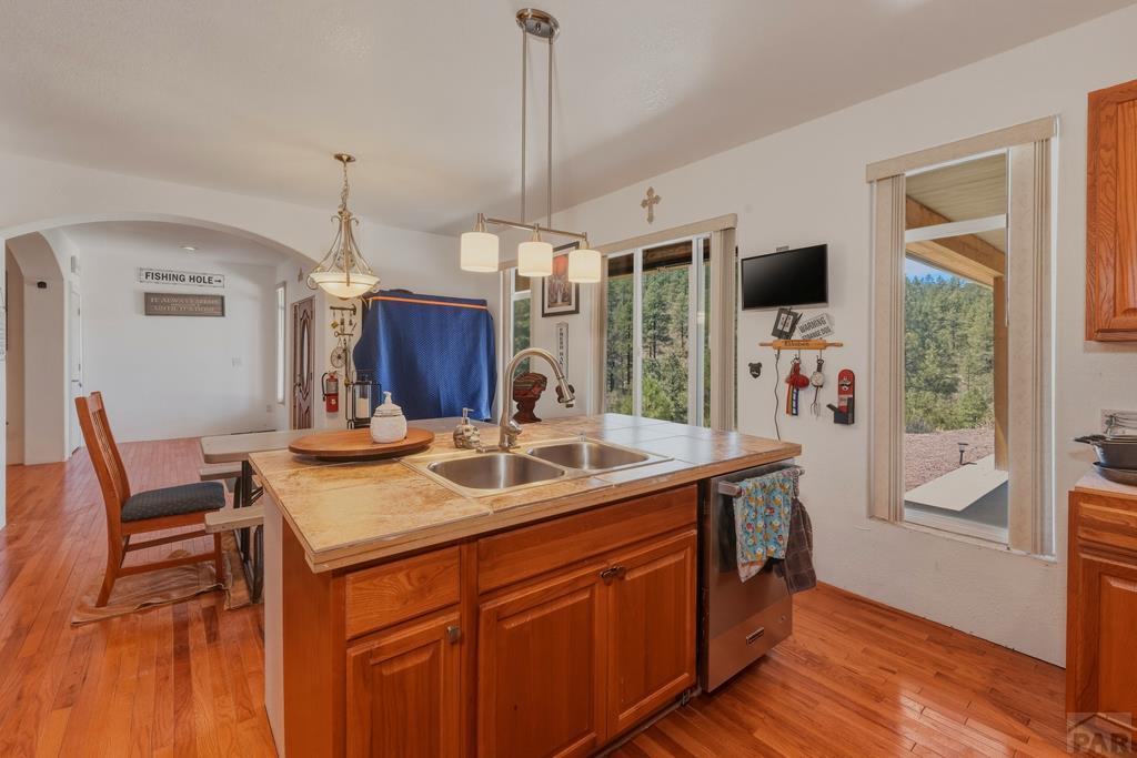 7880 Old Sopris Road Trinidad, CO 81082 - Photo 14 of 49 a kitchen that has a sink and a wooden floor
