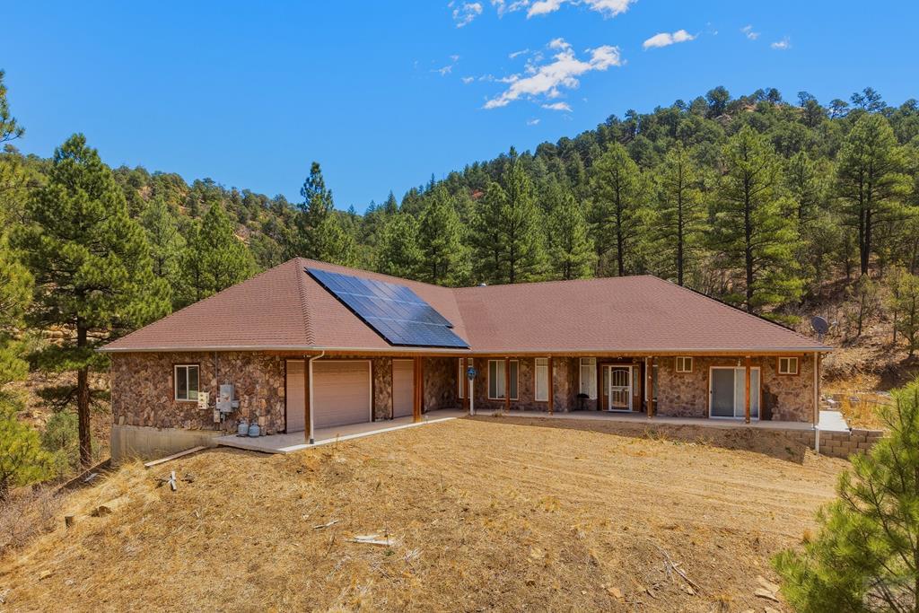 7880 Old Sopris Road Trinidad, CO 81082 - Photo 3 of 49 a house with trees in the background