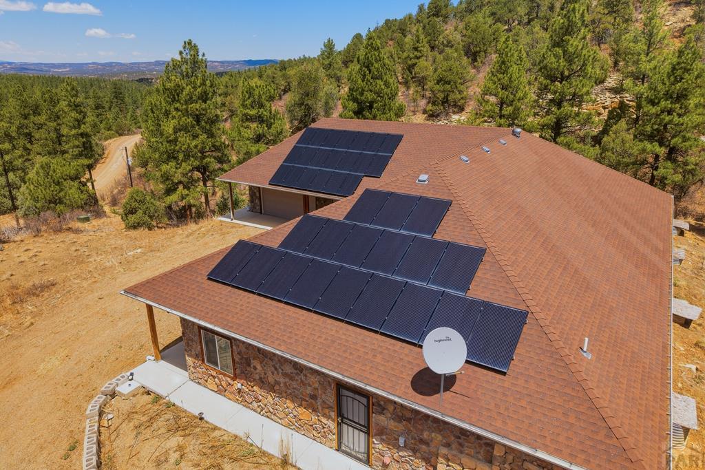 7880 Old Sopris Road Trinidad, CO 81082 - Photo 38 of 49 a roof deck with tall trees