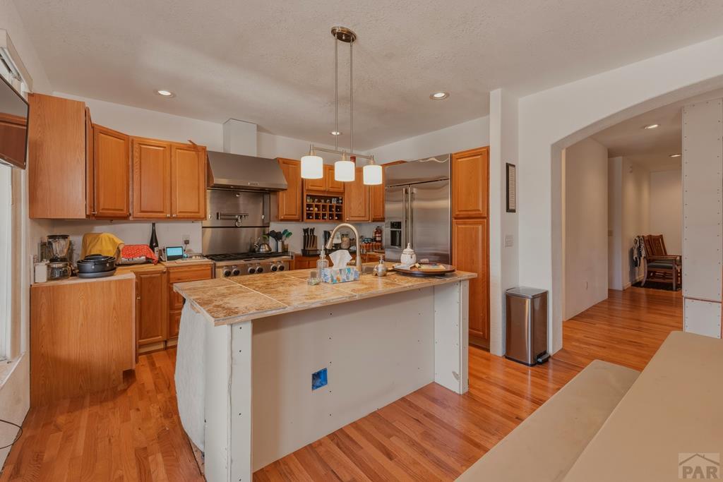 7880 Old Sopris Road Trinidad, CO 81082 - Photo 10 of 49 a kitchen with stainless steel appliances granite countertop a sink stove and refrigerator