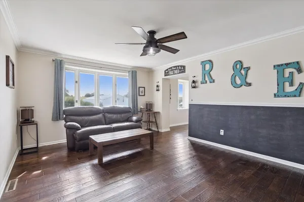 a room with fireplace furniture and a window