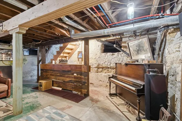 an aerial view of a house with a lake view