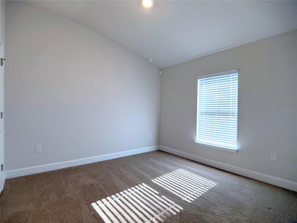 4549 Southeast 25th Loop Ocala, FL 34480 - Photo 15 of 25 a view of an empty room with a window
