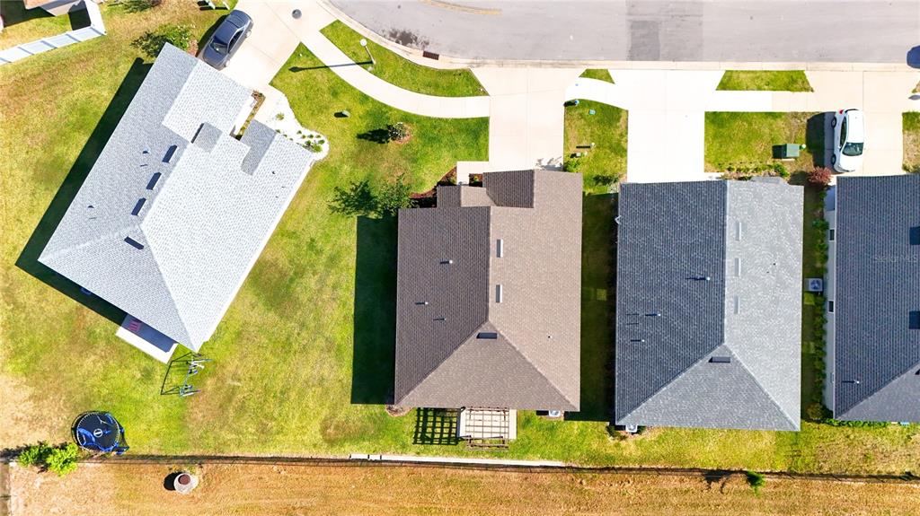 4549 Southeast 25th Loop Ocala, FL 34480 - Photo 23 of 25 a aerial view of a house with swimming pool
