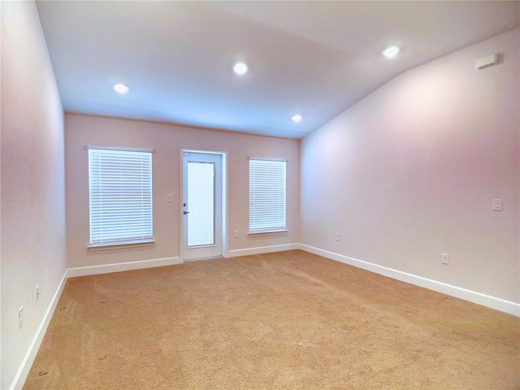 4549 Southeast 25th Loop Ocala, FL 34480 - Photo 10 of 25 a view of an empty room with a window