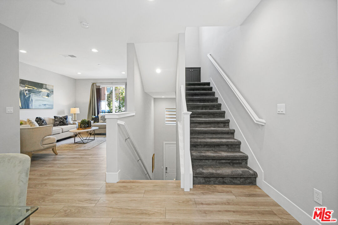 44661 Wisdom Road Fremont, CA 94538 - Photo 17 of 45 a view of entryway and hall with wooden floor