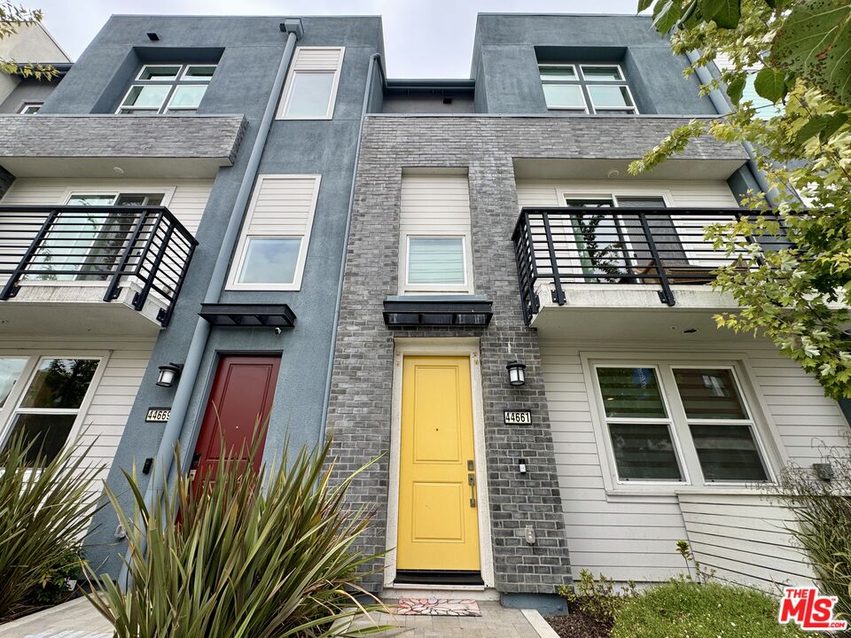 44661 Wisdom Road Fremont, CA 94538 - Photo 2 of 45 a front view of a multi story residential apartment building