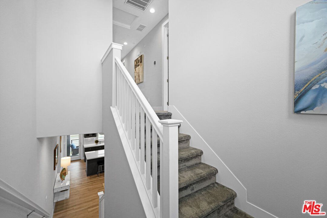 44661 Wisdom Road Fremont, CA 94538 - Photo 21 of 45 a view of entryway and hall with wooden floor