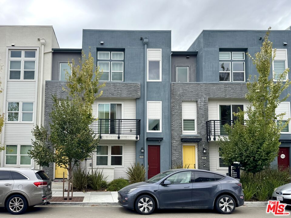 44661 Wisdom Road Fremont, CA 94538 - Photo 45 of 45 a car parked in front of a house