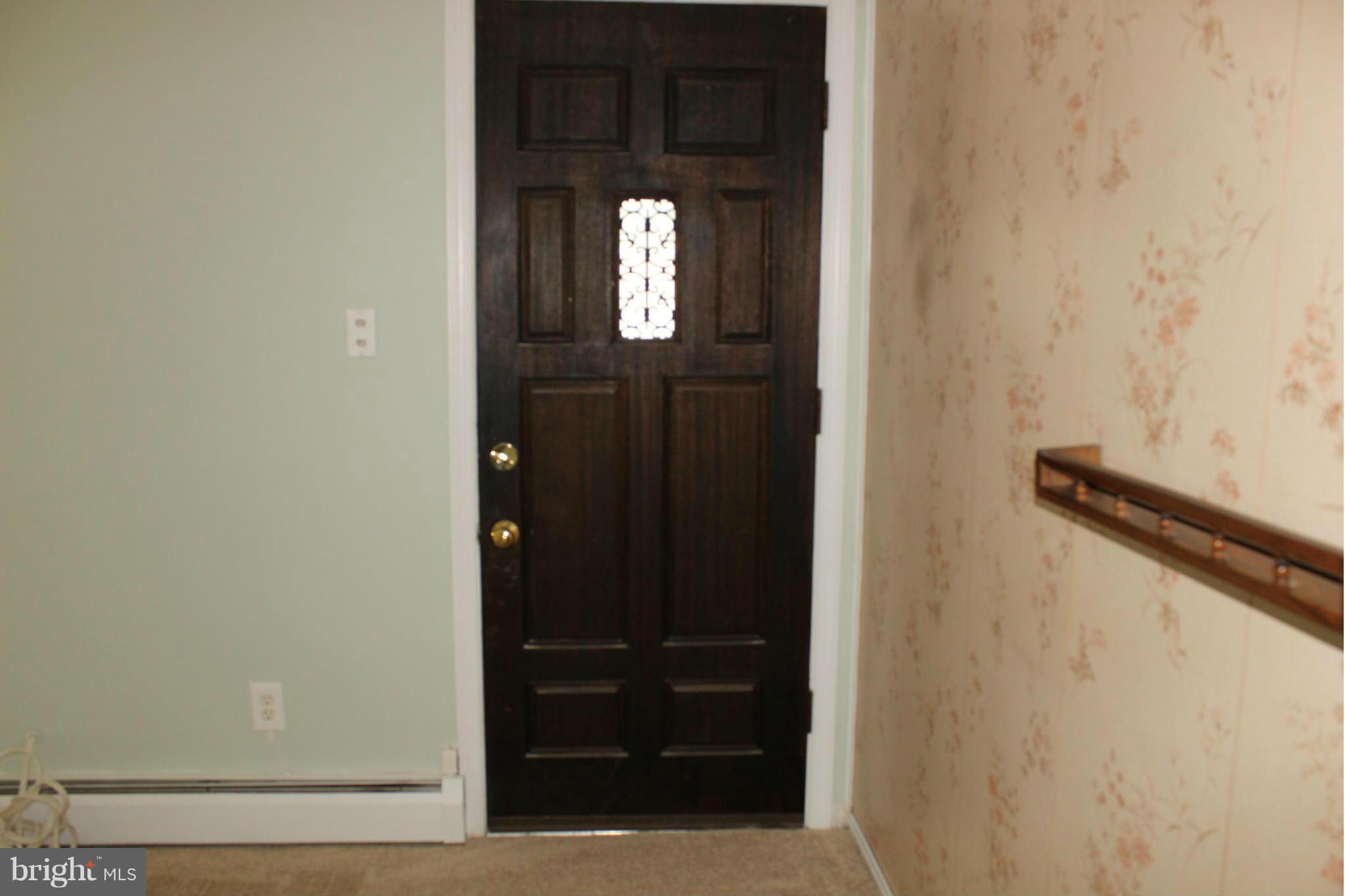 7726 Garrison Road Hyattsville, MD 20784 - Photo 21 of 25 Living Room with new paint and carpet
