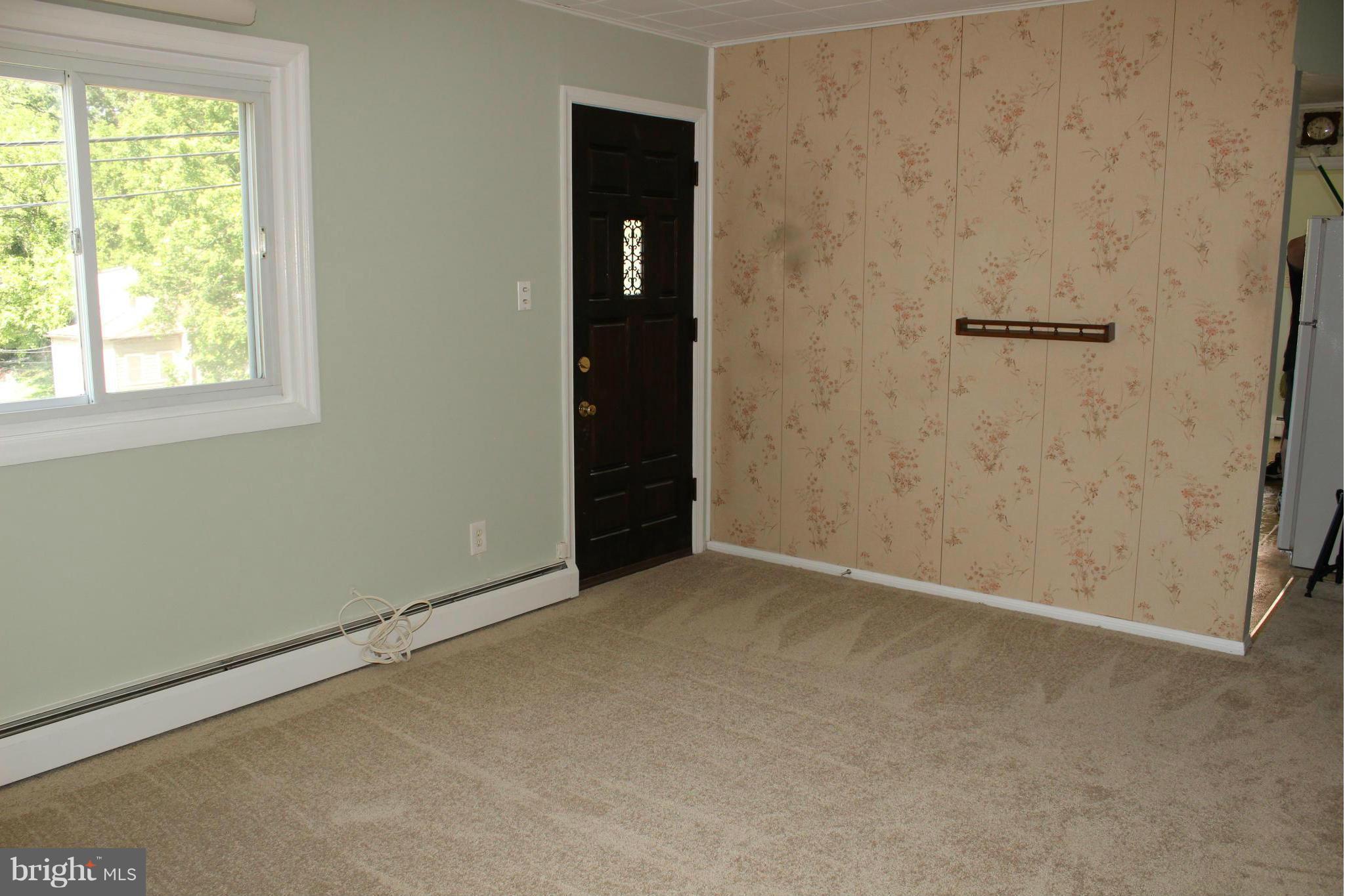 7726 Garrison Road Hyattsville, MD 20784 - Photo 4 of 25 New carpet and paint