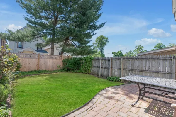 a view of a backyard with a garden