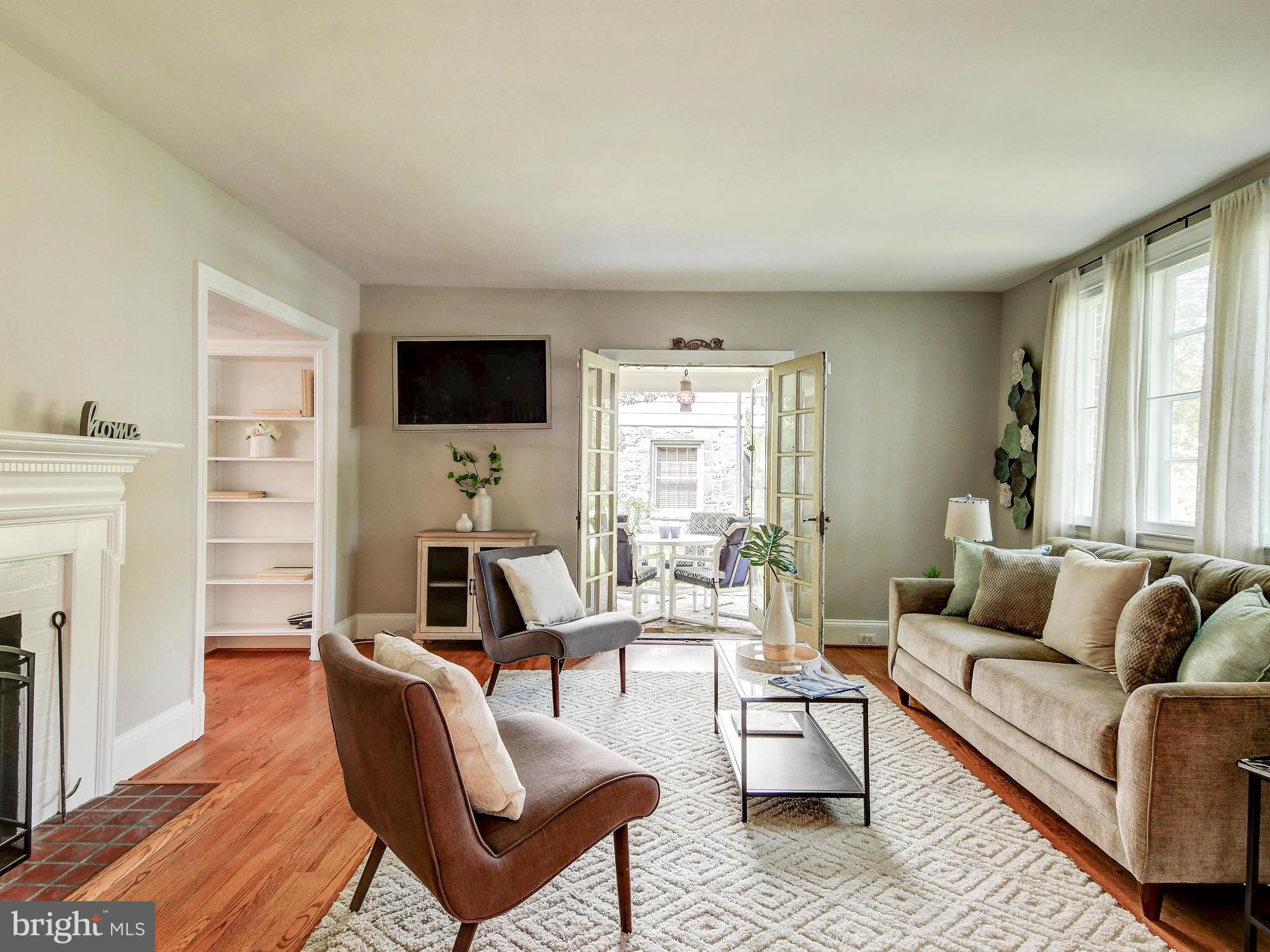 323 Taplow Road Baltimore, MD 21212 - Photo 6 of 41 Living Room with French Doors to Side Porch