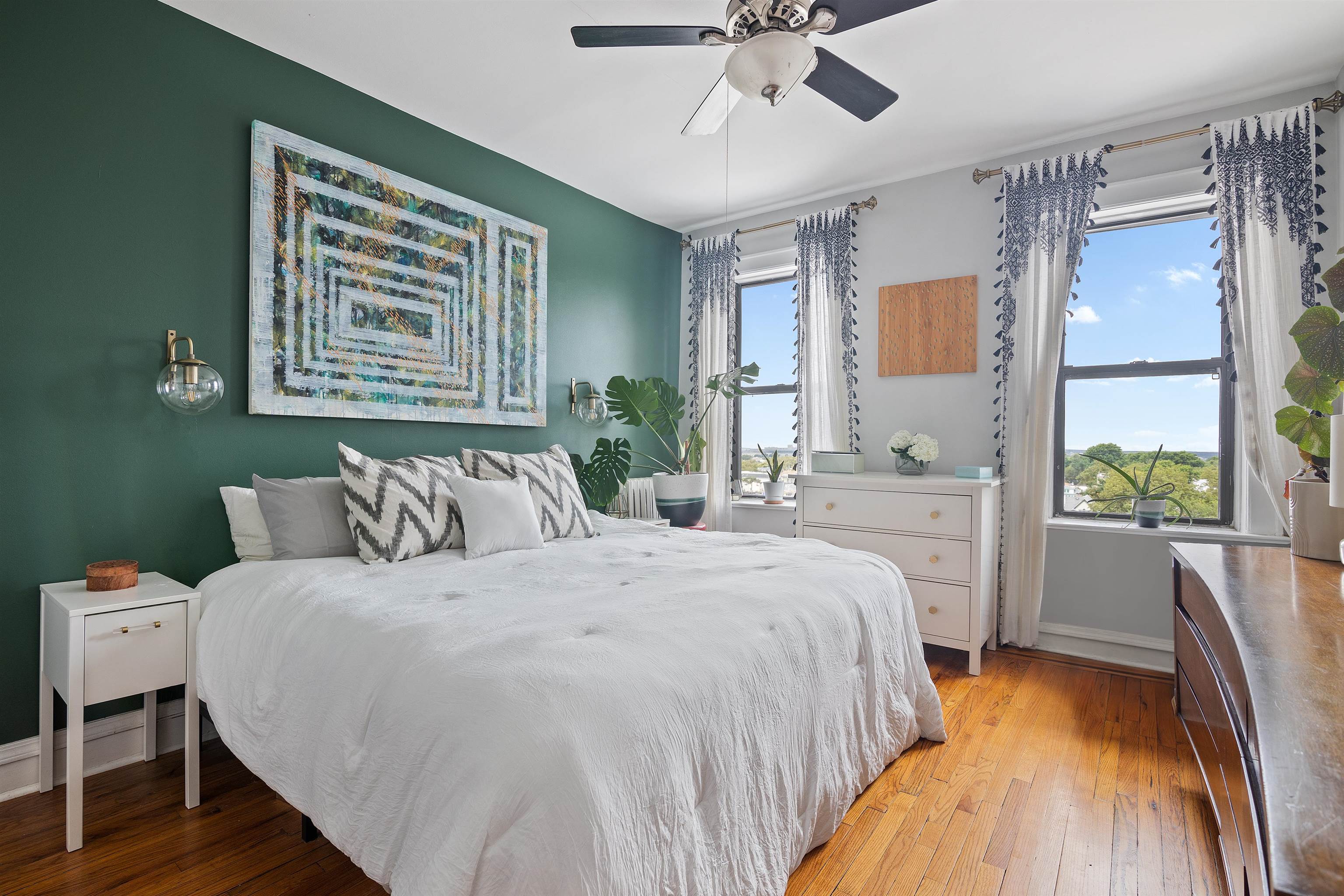 277 Harrison Avenue, Unit E6 Jersey City, NJ 07304 - Photo 5 of 14 a spacious bedroom with a bed and a large window