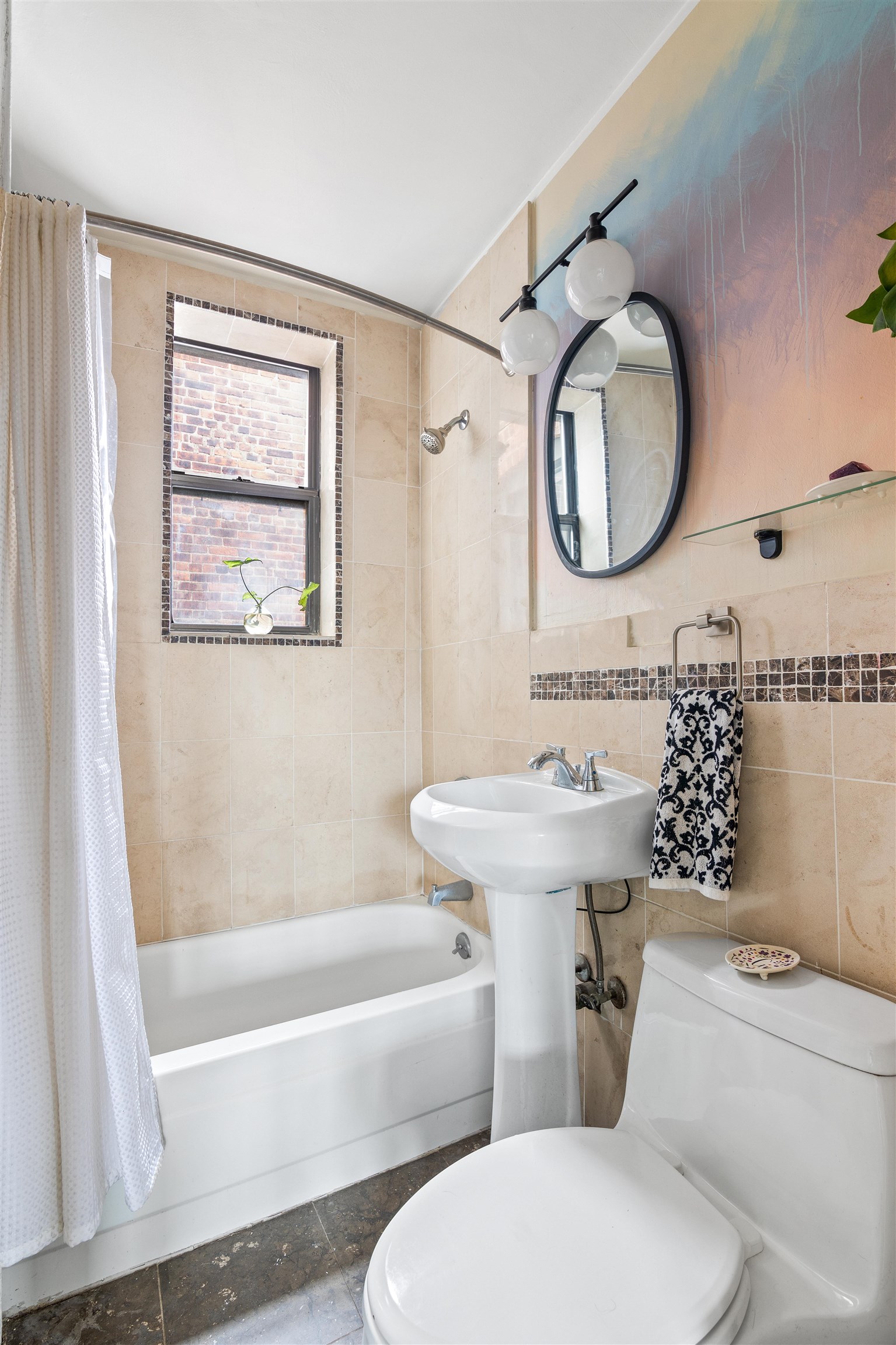 277 Harrison Avenue, Unit E6 Jersey City, NJ 07304 - Photo 9 of 14 a bathroom with a toilet a sink and a mirror