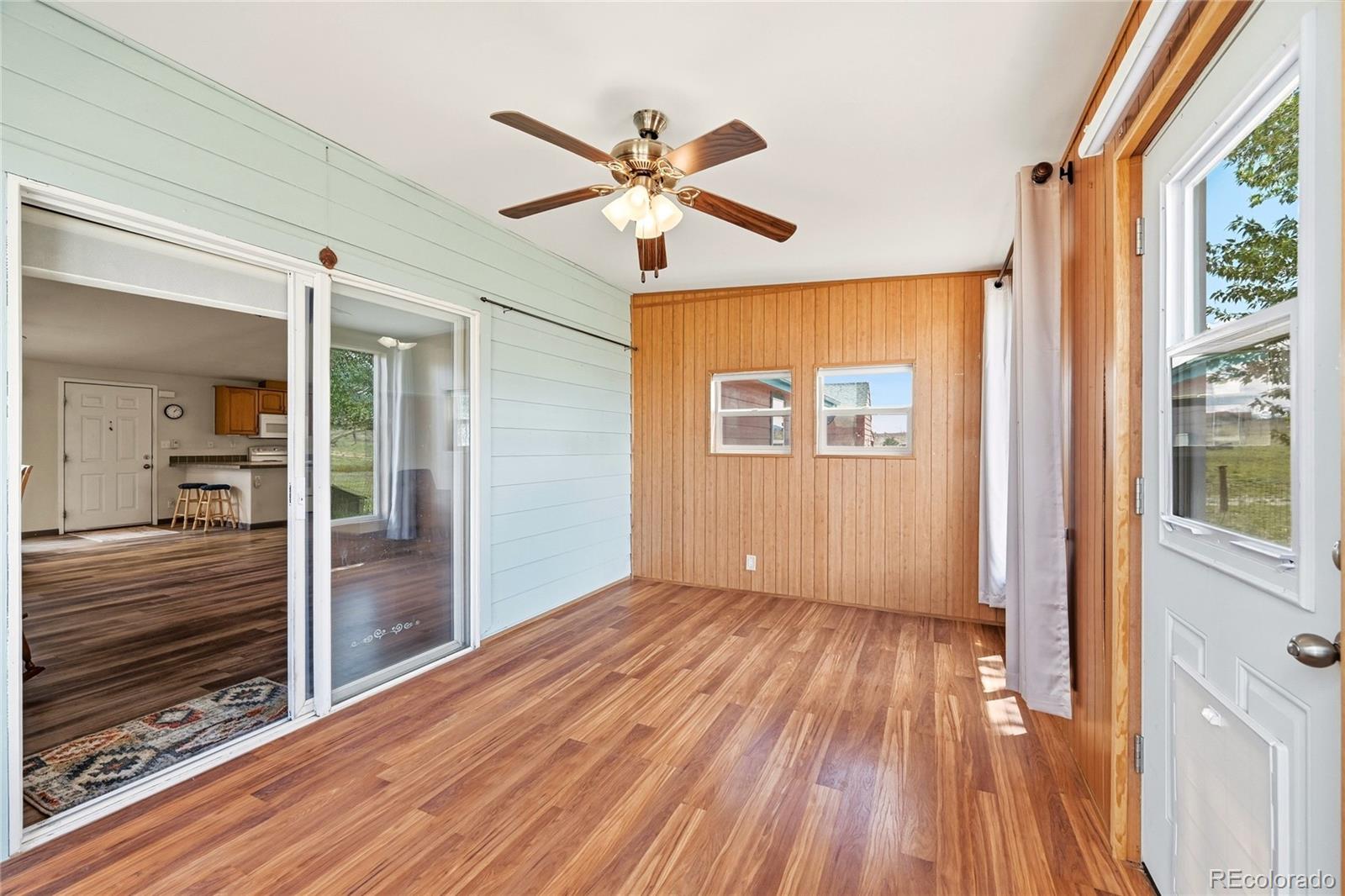 20300 Old Ranch Loop Nathrop, CO 81236 - Photo 14 of 35 a view of empty room with wooden floor