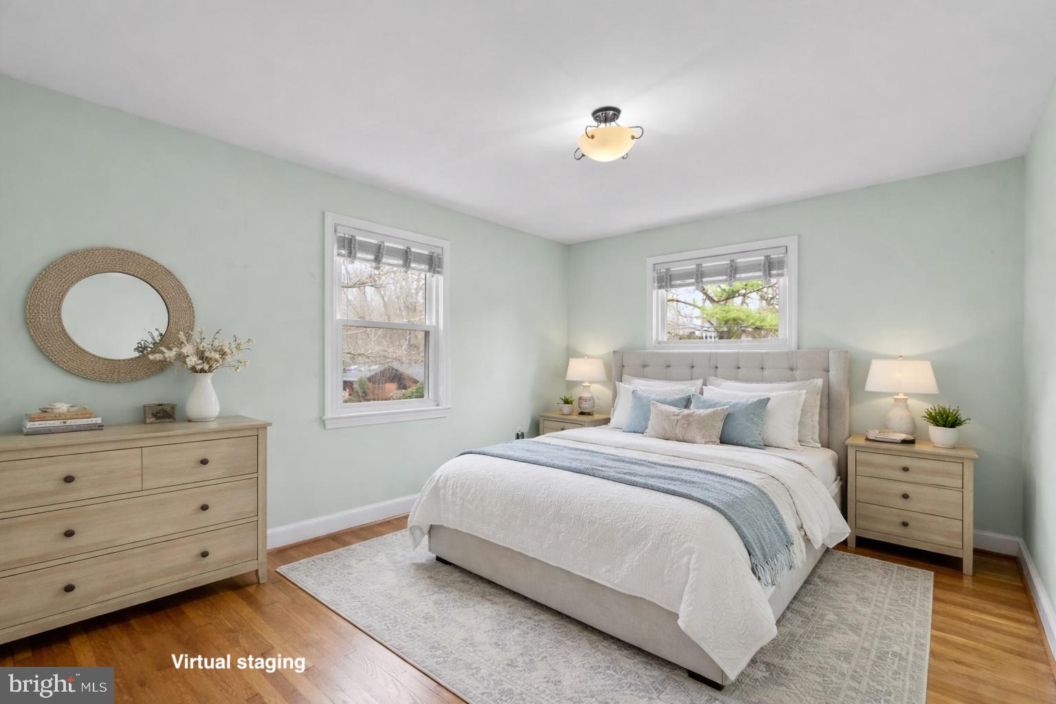 414 Hillmoor Drive Silver Spring, MD 20901 - Photo 27 of 49 a bedroom with a bed and a dresser