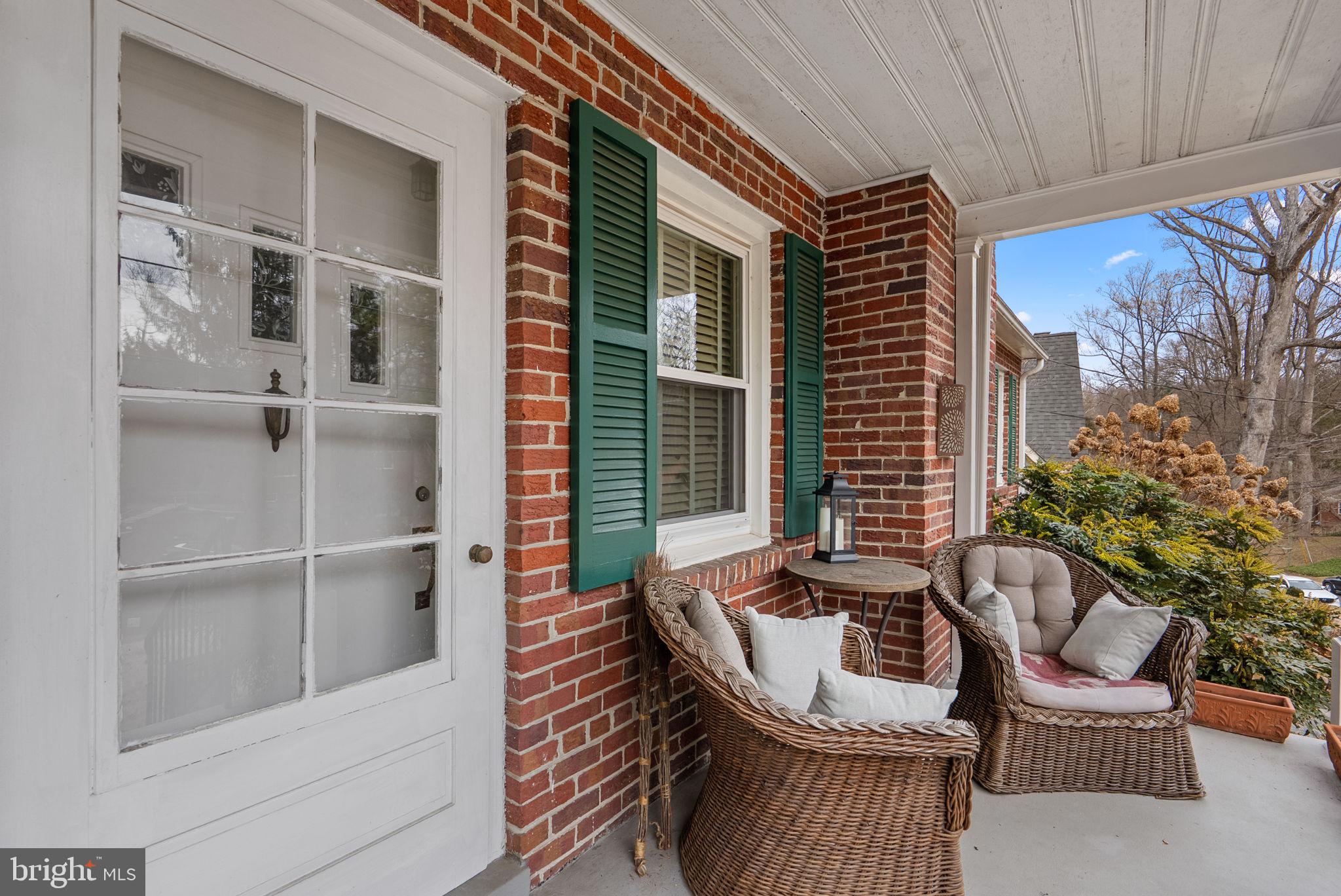 414 Hillmoor Drive Silver Spring, MD 20901 - Photo 3 of 49 a balcony with furniture and a potted plant
