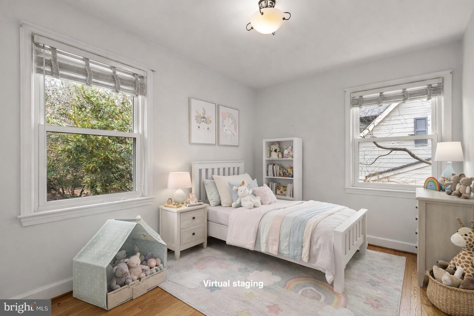 414 Hillmoor Drive Silver Spring, MD 20901 - Photo 32 of 49 a bedroom with a bed and a window