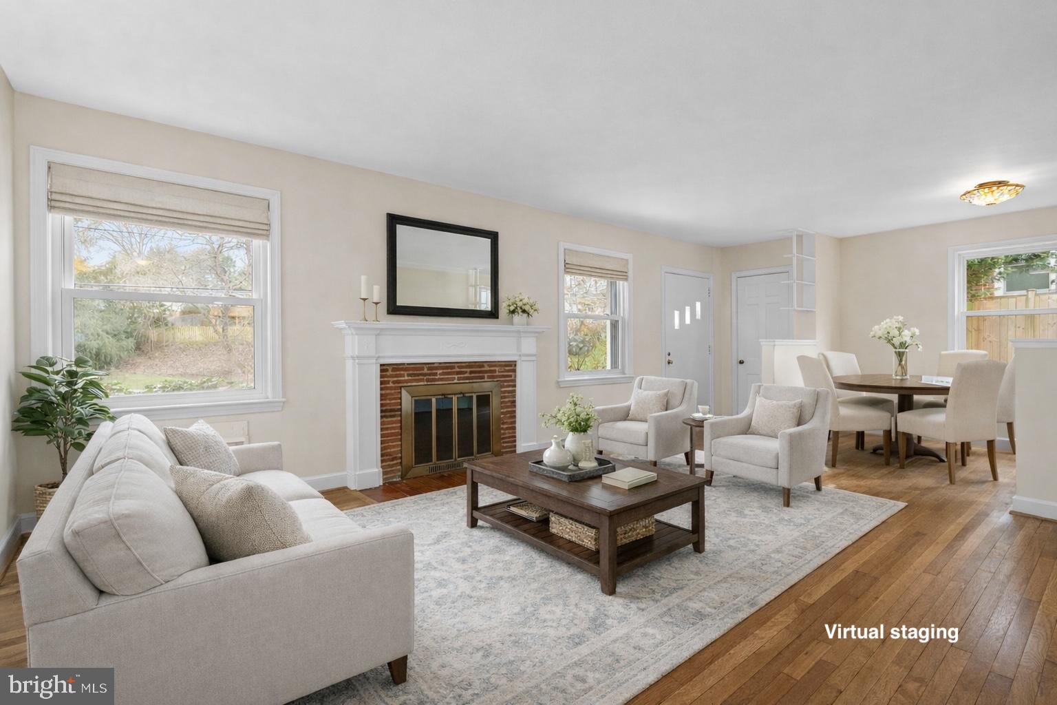 414 Hillmoor Drive Silver Spring, MD 20901 - Photo 9 of 49 a living room with furniture and a fireplace