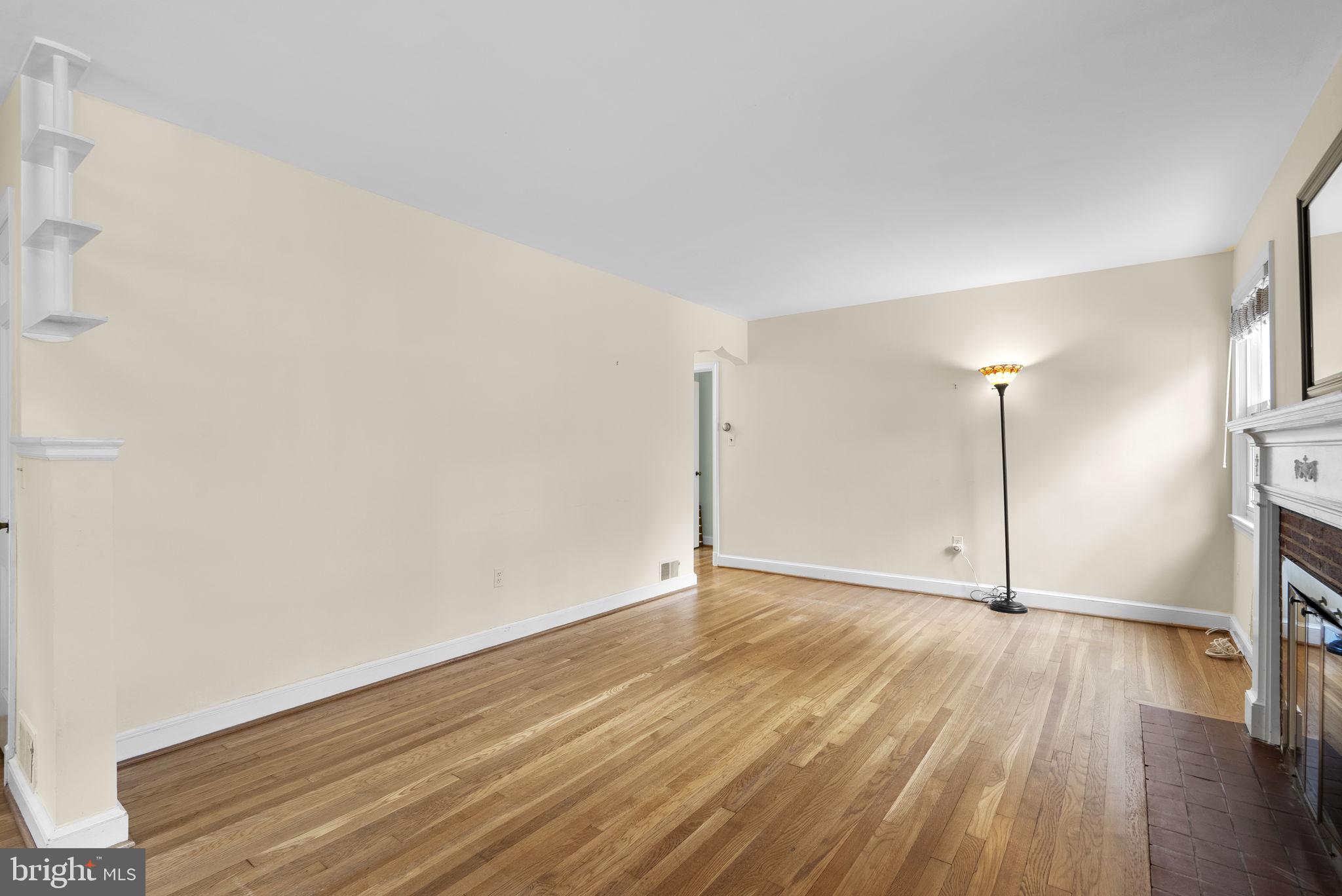 414 Hillmoor Drive Silver Spring, MD 20901 - Photo 10 of 49 a view of a livingroom with wooden floor